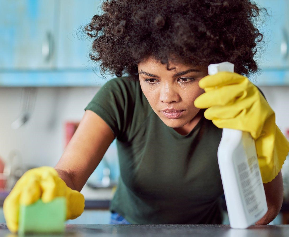 Girl Cleaning A Surface