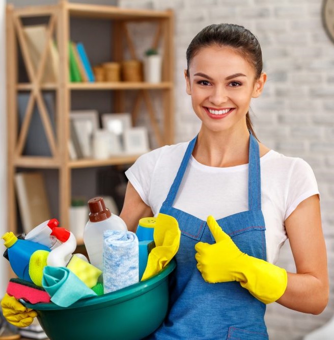 girl with cleaning accessories